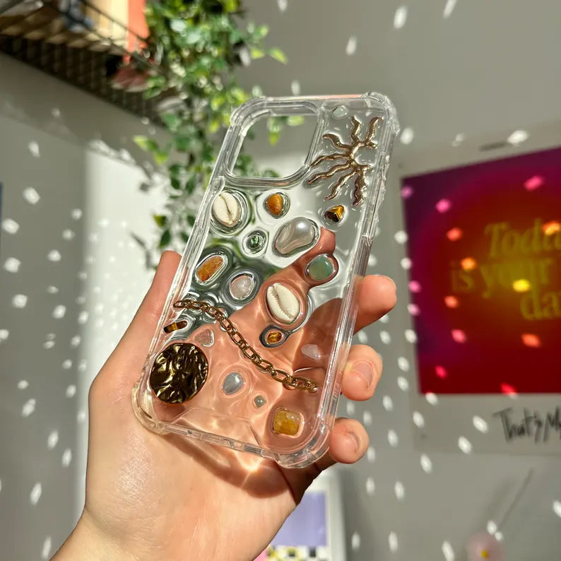 Resin designer iphone case, aesthetic iphone case for iPhone 16 15 14 13 12 11 pro max plus mini case, Sun with shells and pebbles